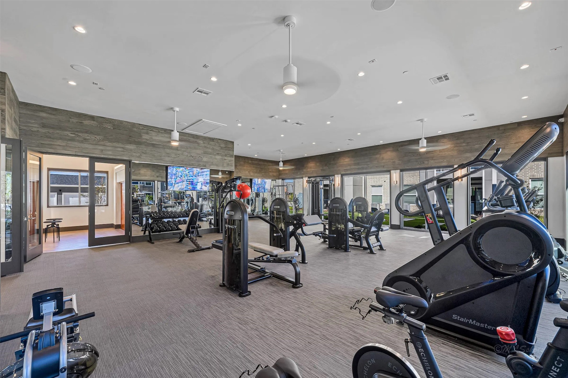 3830 Fm 2920 Rd Spring, Unit 8306 Spring, TX 77388 - Photo 30 of 32 a view of a room with gym equipment