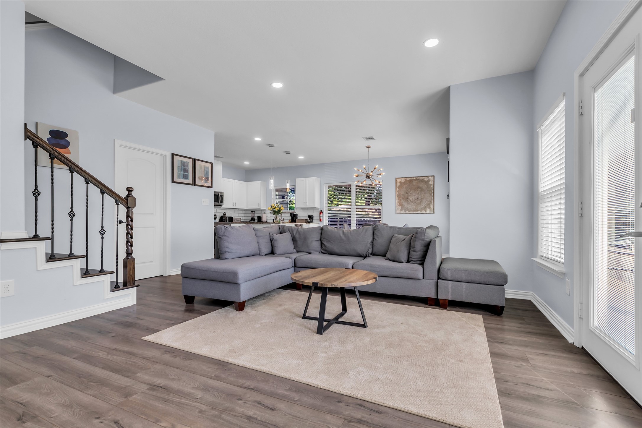 197 Rain Forest Road Onalaska, TX 77360 - Photo 11 of 25 a living room with furniture and a wooden floor