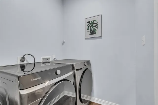 a room with a sink and a mirror