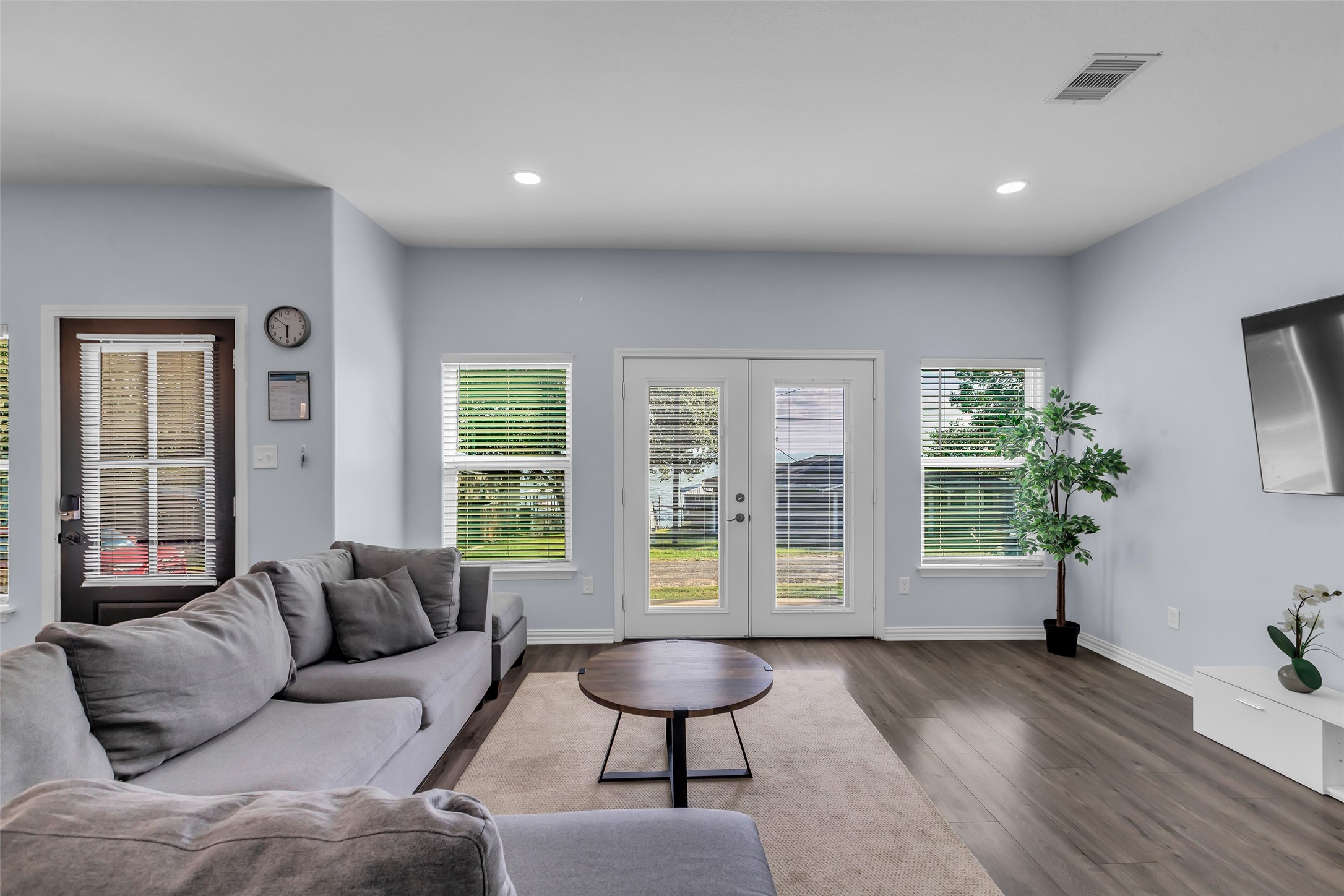 197 Rain Forest Road Onalaska, TX 77360 - Photo 9 of 25 a living room with furniture and a large window