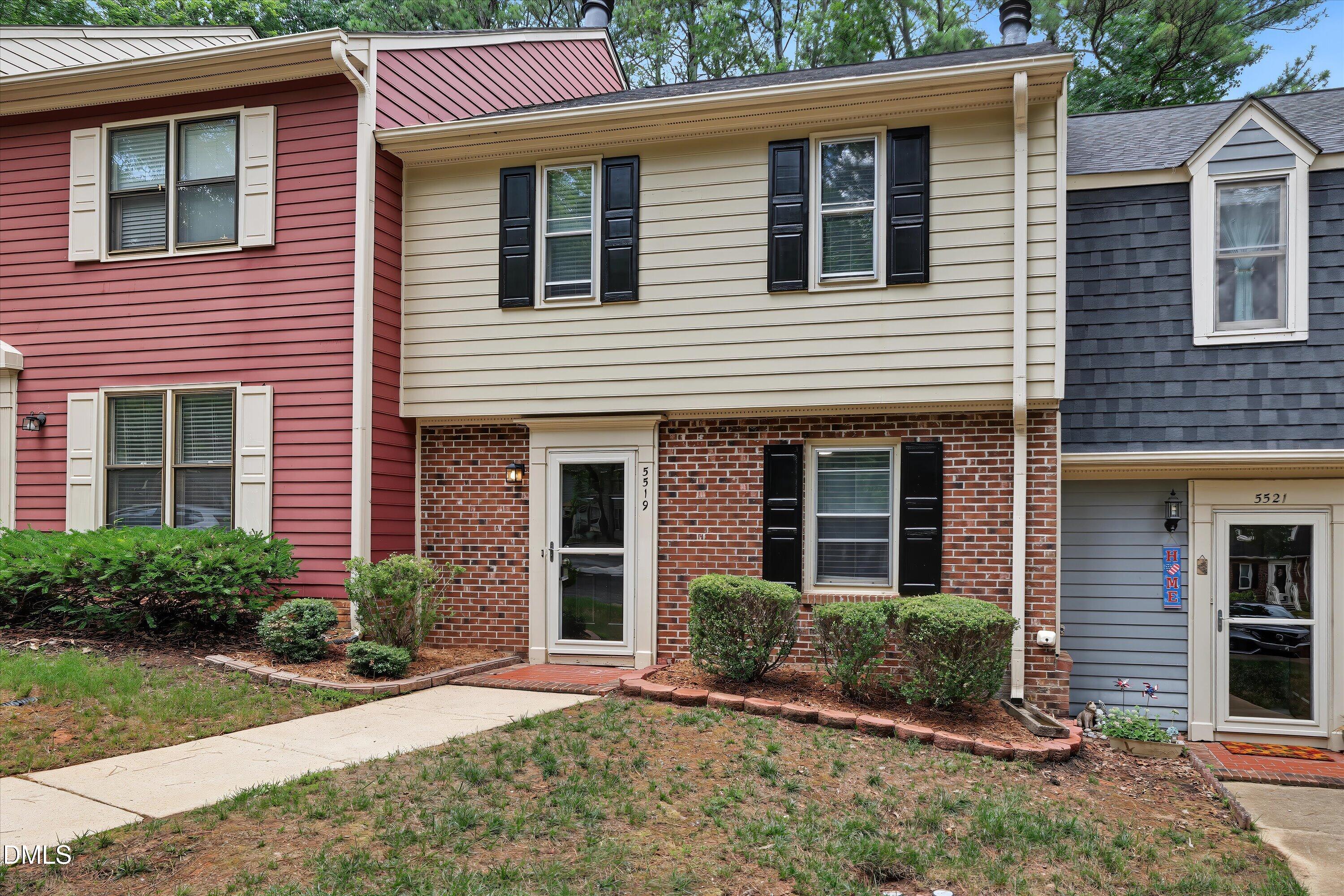 5519 Hamstead Crossing Raleigh, NC 27612 - Photo 2 of 33 a front view of a house with a yard