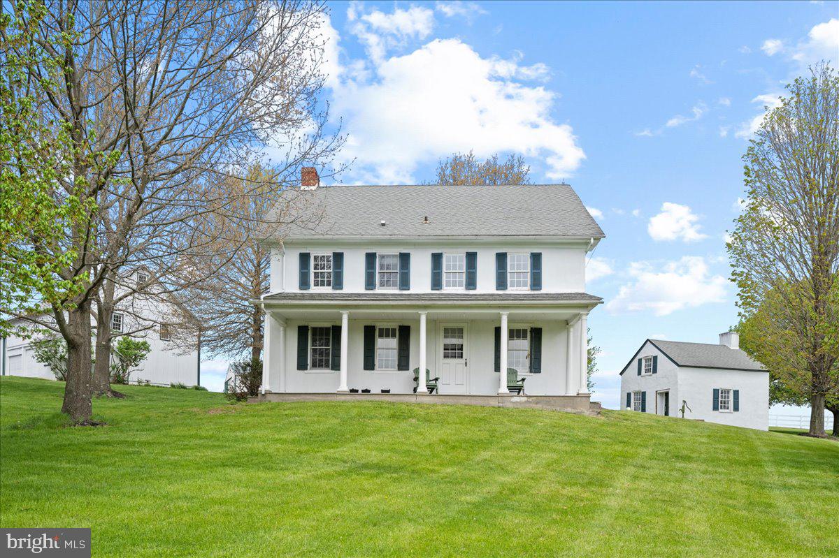 215 Nockamixon Road Kintnersville, PA 18930 - Photo 13 of 55 a front view of a house with a garden