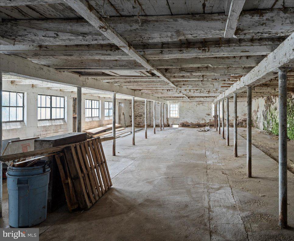 215 Nockamixon Road Kintnersville, PA 18930 - Photo 35 of 55 a view of an empty room with windows