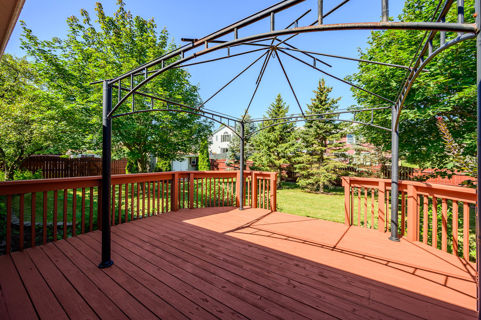638 Colony Avenue Lindenhurst, IL 60046 - Photo 13 of 15 a view of a deck with wooden floor and fence
