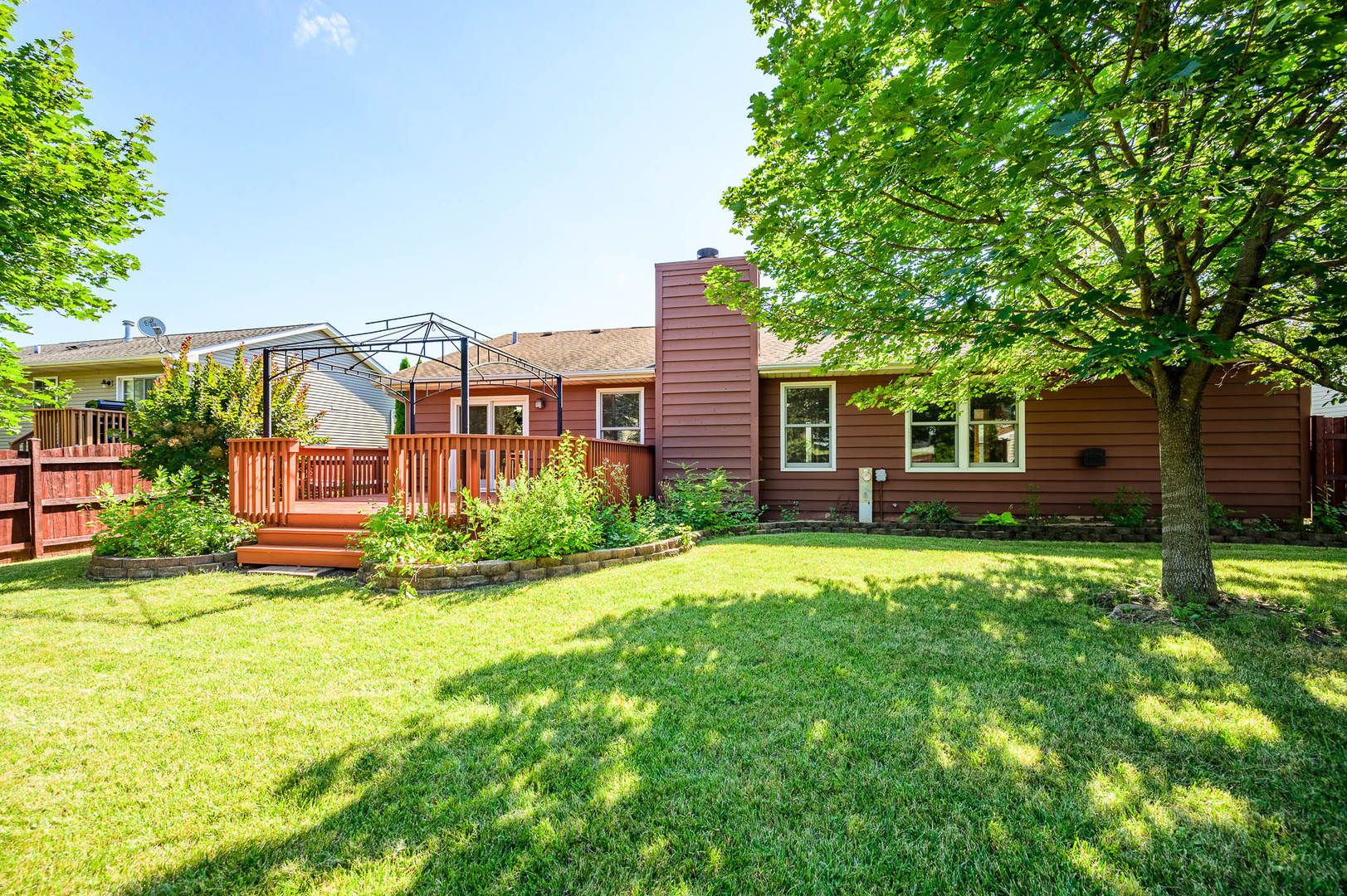 638 Colony Avenue Lindenhurst, IL 60046 - Photo 15 of 15 a view of a house with backyard and a tree