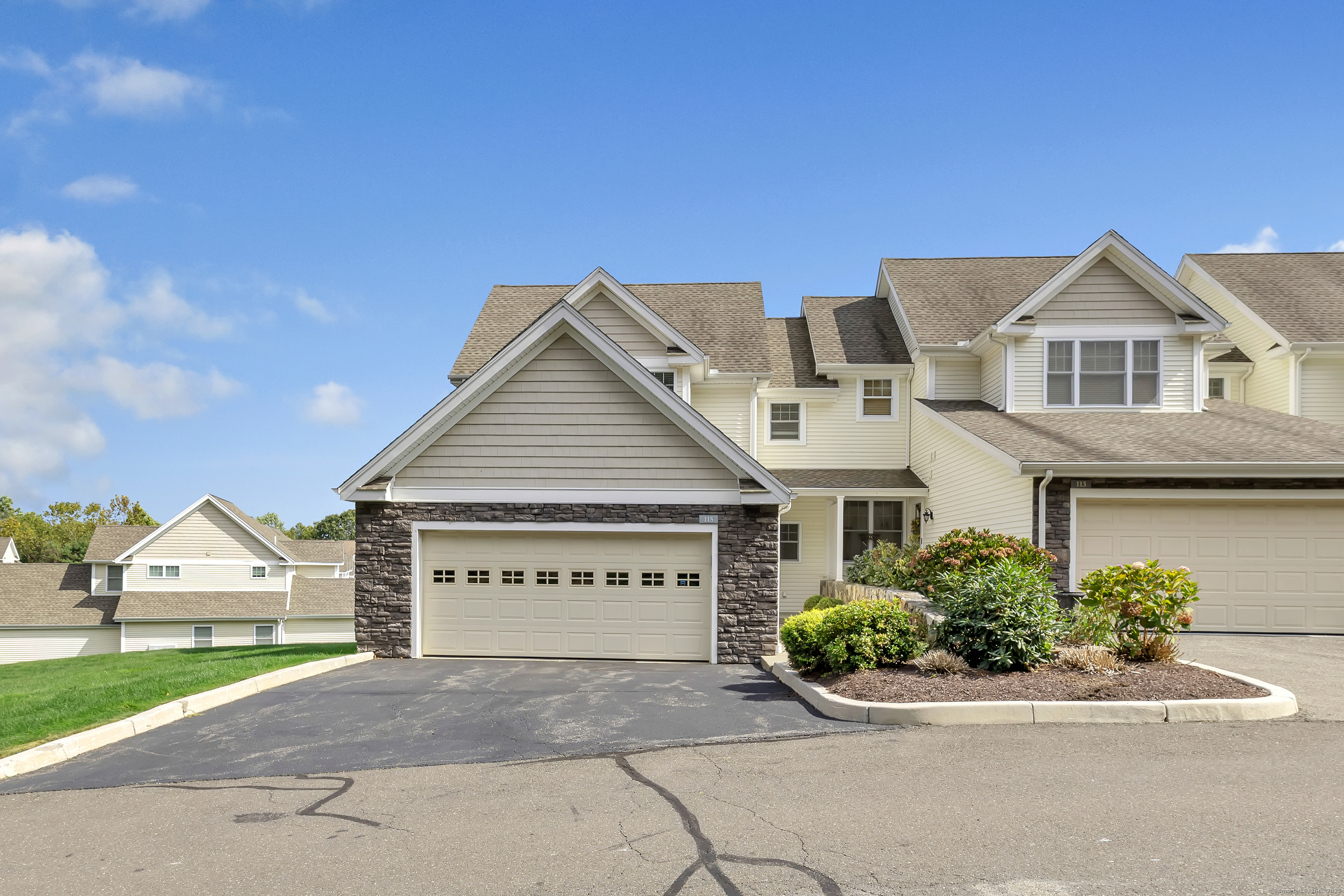 115 Kyles Way, Unit 115 Shelton, CT 06484 - Photo 1 of 1 front view of a house with a yard