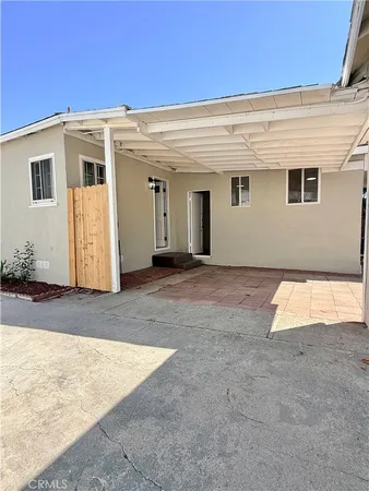 a view of a backyard of a house