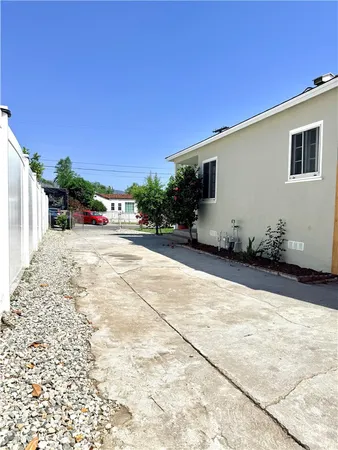 a view of a house with a tree