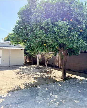 a bathroom with a black white checkered floor