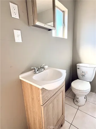 a bathroom with a tub and a sink