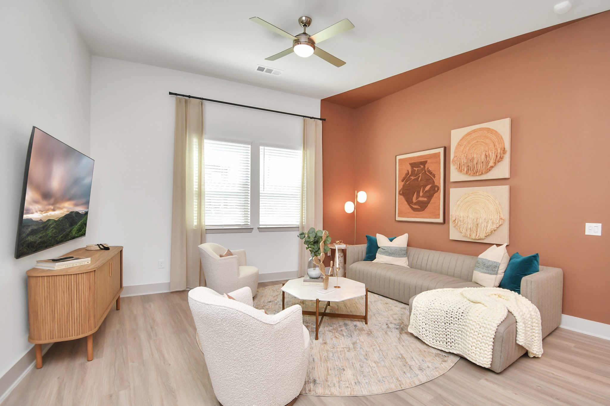 1617 Enid Street, Unit 177 Houston, TX 77009 - Photo 9 of 50 a living room with furniture and a flat screen tv