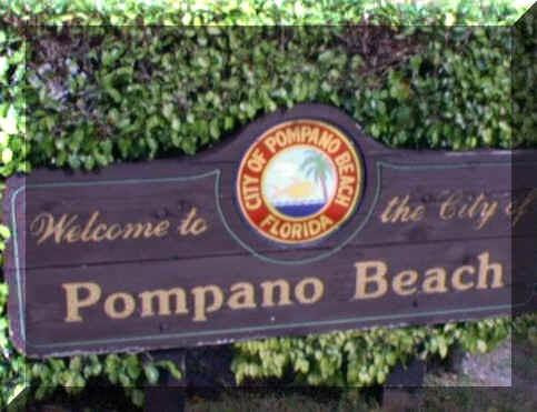 3205 Colony Club Road, Unit 1 Pompano Beach, FL 33062 - Photo 4 of 12 a sign that is on a wooden wall