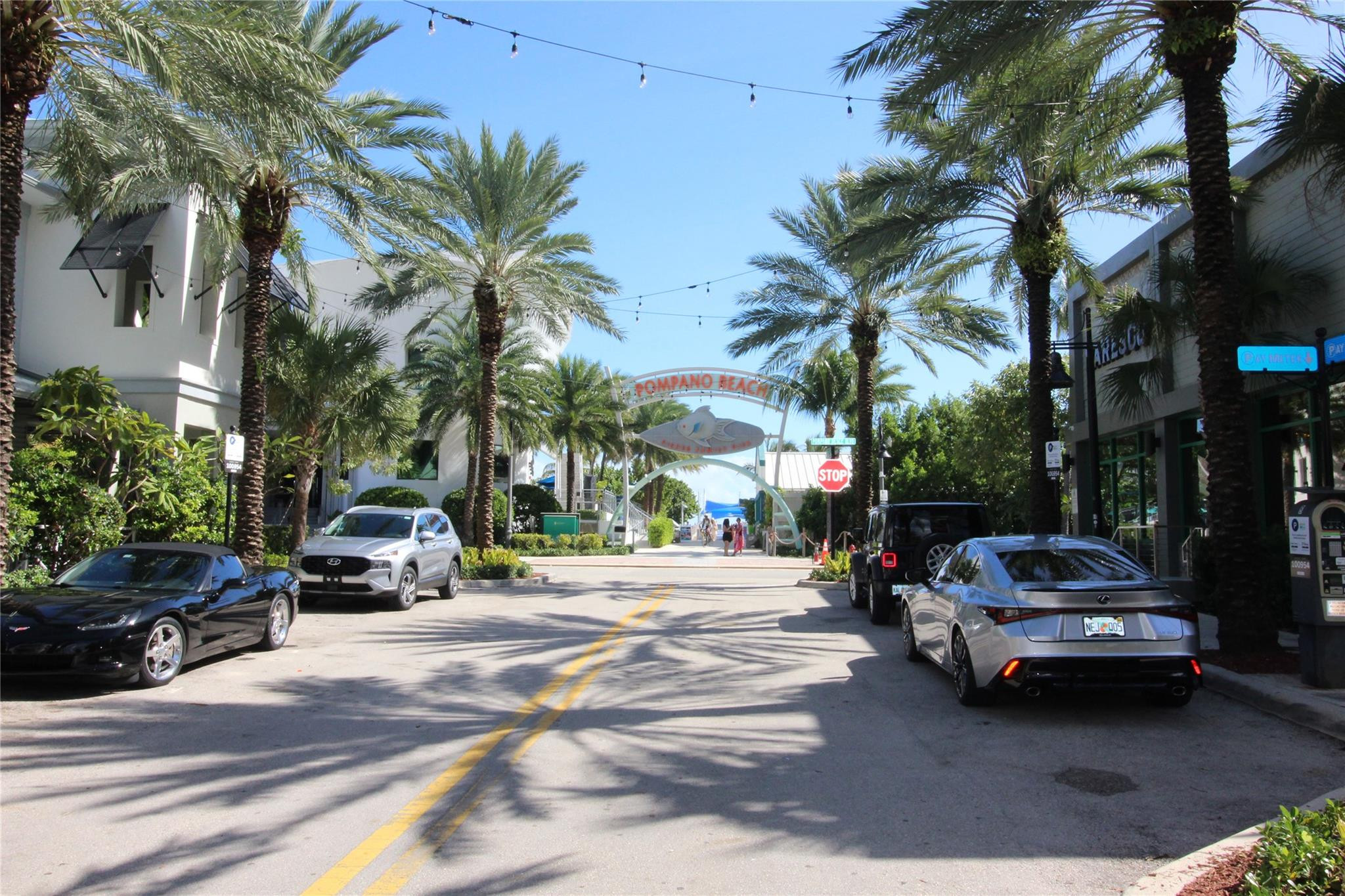 3205 Colony Club Road, Unit 1 Pompano Beach, FL 33062 - Photo 5 of 12 a car parked on the side of a street
