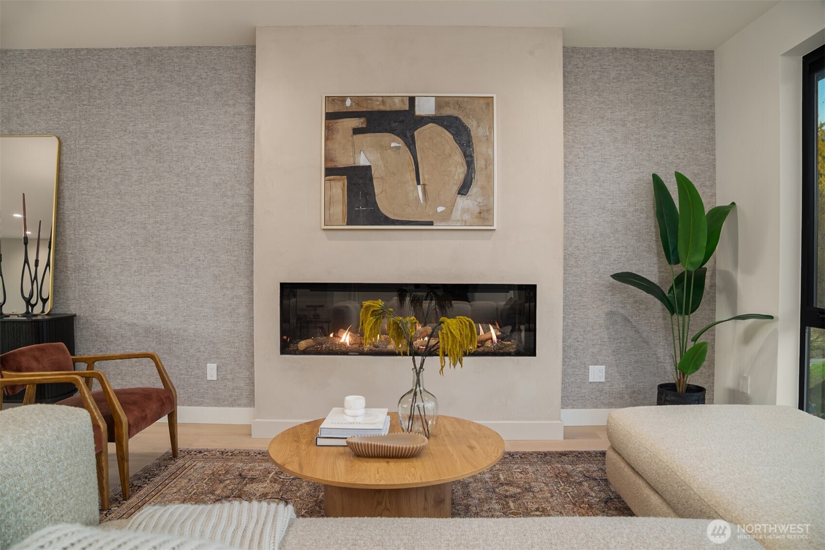 614 5th Avenue South, Unit A103 Edmonds, WA 98020 - Photo 16 of 28 a living room with furniture and a fireplace