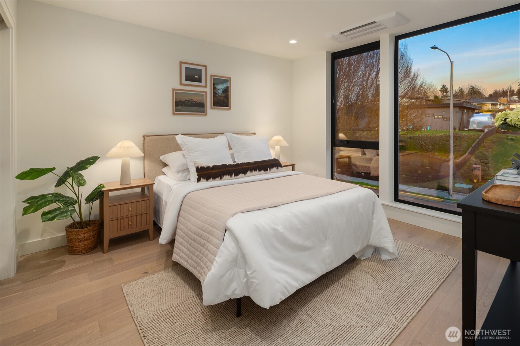 614 5th Avenue South, Unit A103 Edmonds, WA 98020 - Photo 24 of 28 a bedroom with a bed and a window