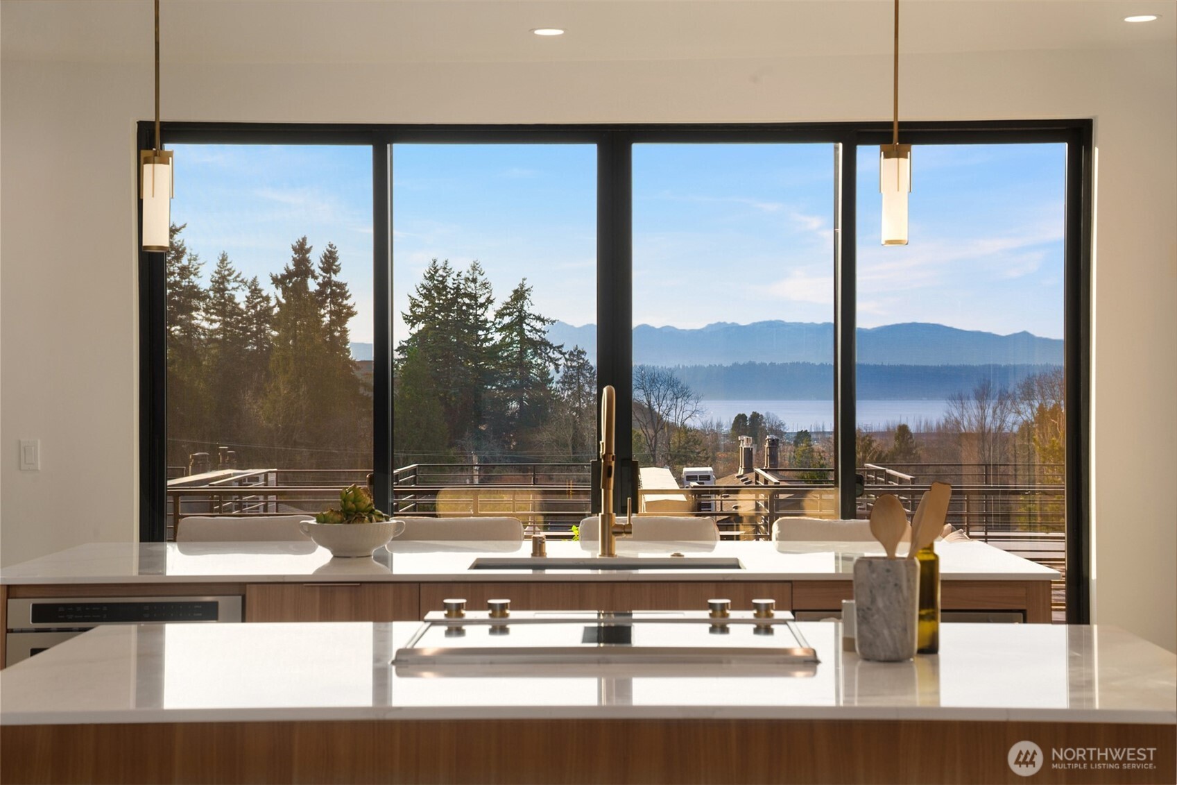 614 5th Avenue South, Unit A103 Edmonds, WA 98020 - Photo 5 of 28 a window with a glass top table and chairs