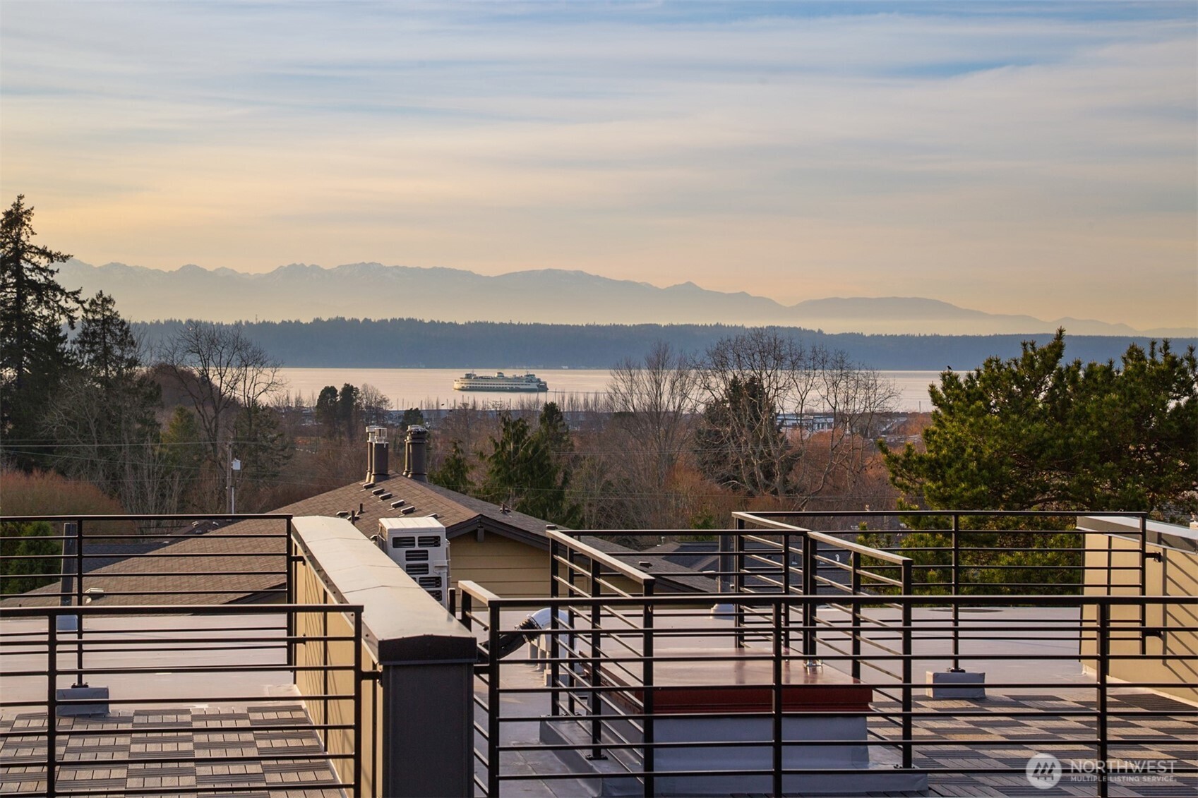 614 5th Avenue South, Unit A103 Edmonds, WA 98020 - Photo 8 of 28 a view of a lake from a balcony