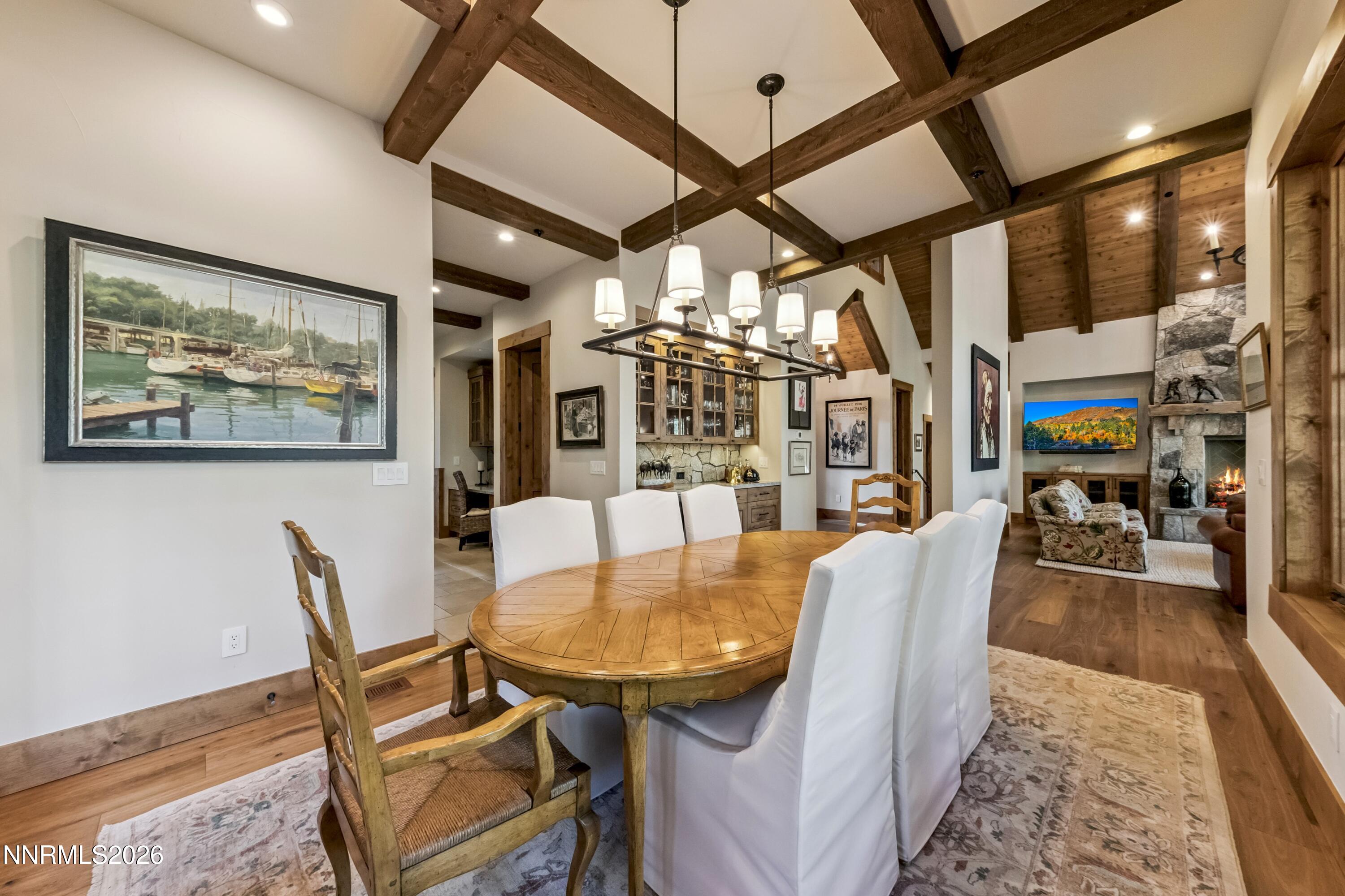 261 Redding Way Carson City, NV 89705 - Photo 18 of 90 a dining room with furniture and chandelier