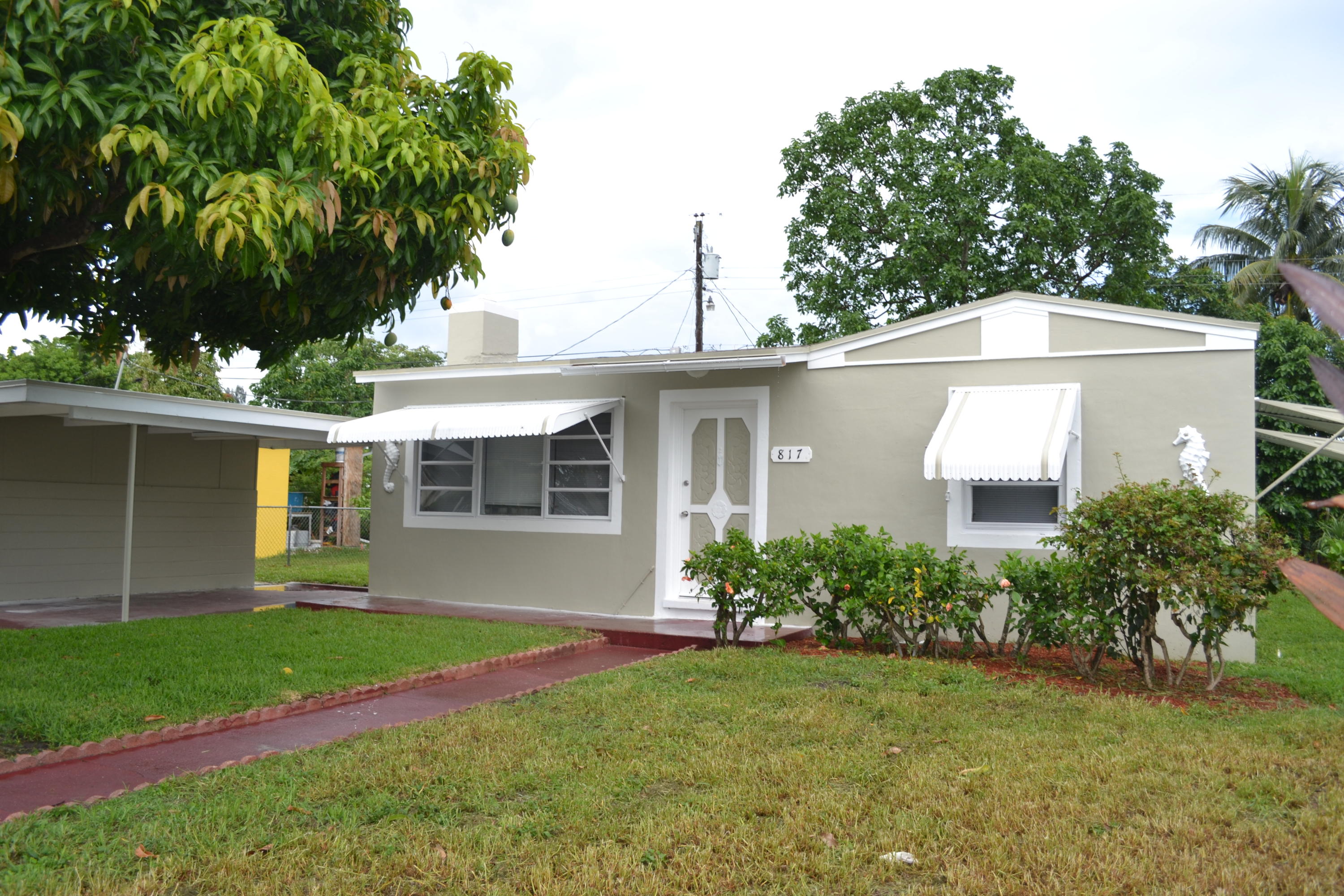 817 Beech Road West Palm Beach, FL 33409 - Photo 2 of 8 EXTERIOR 1