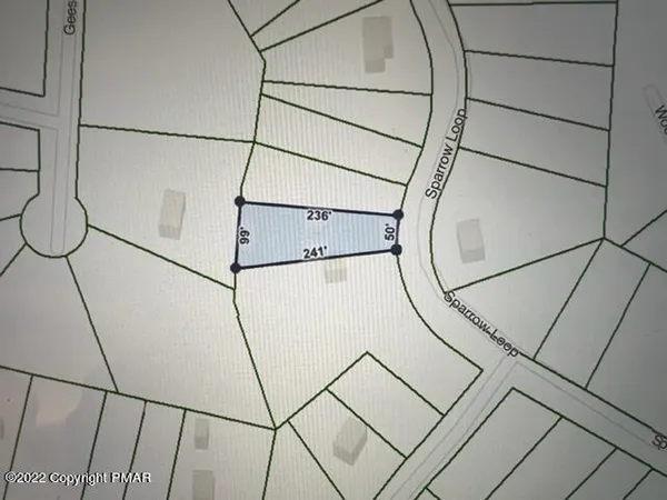 a sign in front of a building