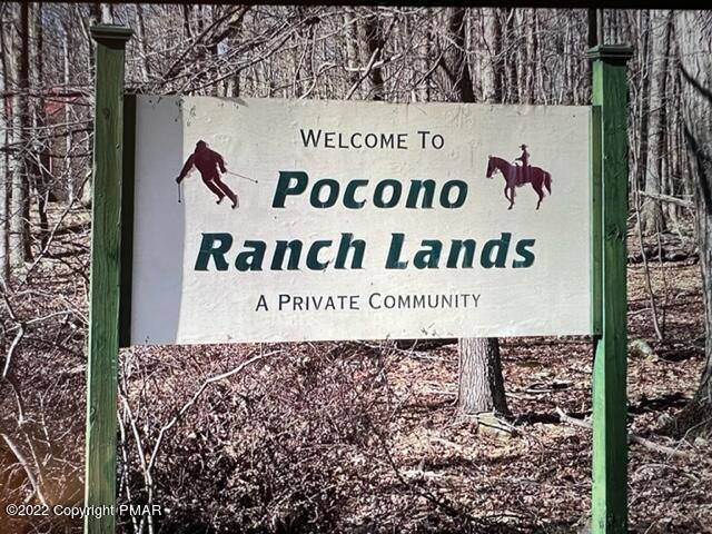 295 Sparrow Loop Bushkill, PA 18324 - Photo 3 of 4 a sign in front of a building