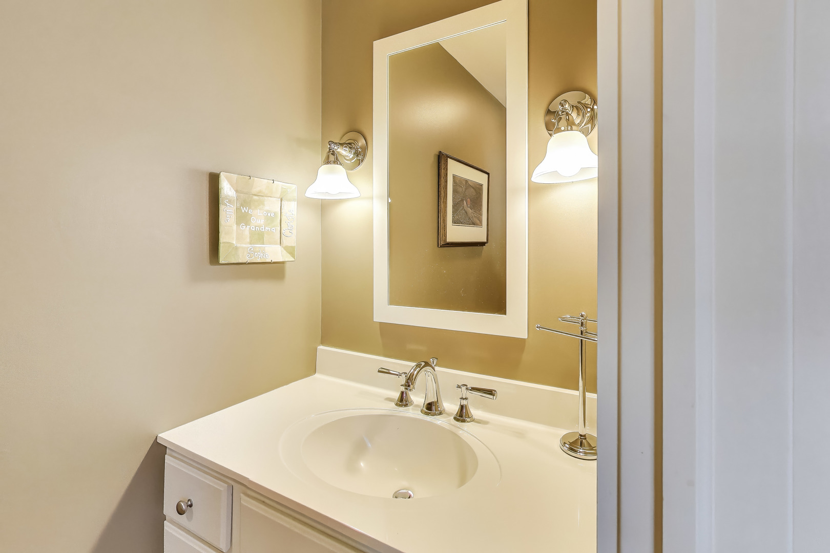 228 East Center Avenue Lake Bluff, IL 60044 - Photo 15 of 39 a bathroom with a sink and a mirror