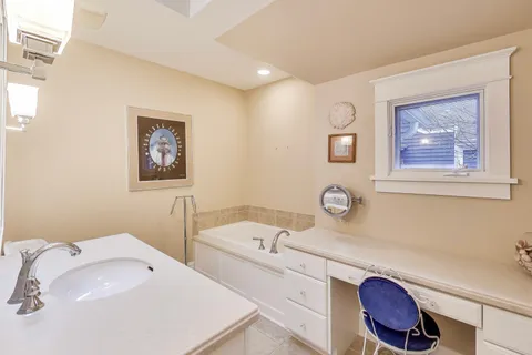 a bathroom with a toilet and a sink