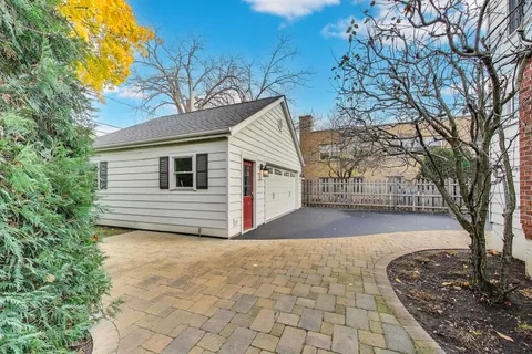 a view of a backyard of the house