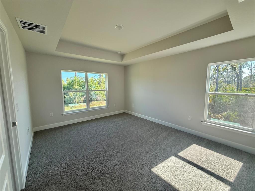 135 Hardee Way Rotonda West, FL 33947 - Photo 19 of 30 an empty room with a window