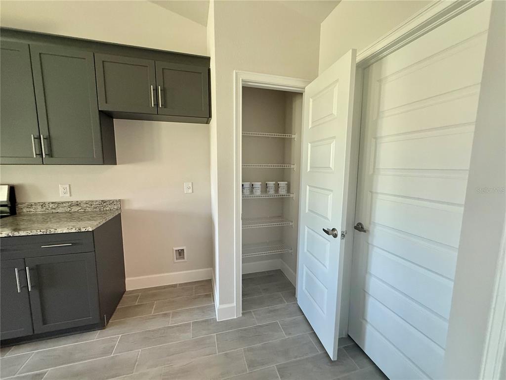135 Hardee Way Rotonda West, FL 33947 - Photo 7 of 30 a bathroom with a sink and a shower