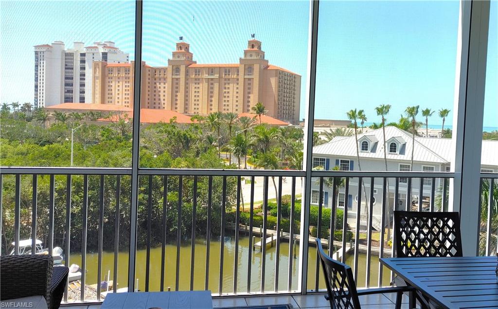 400 Flagship Drive, Unit 501 Naples, FL 34108 - Photo 27 of 38 a view of a balcony with city view