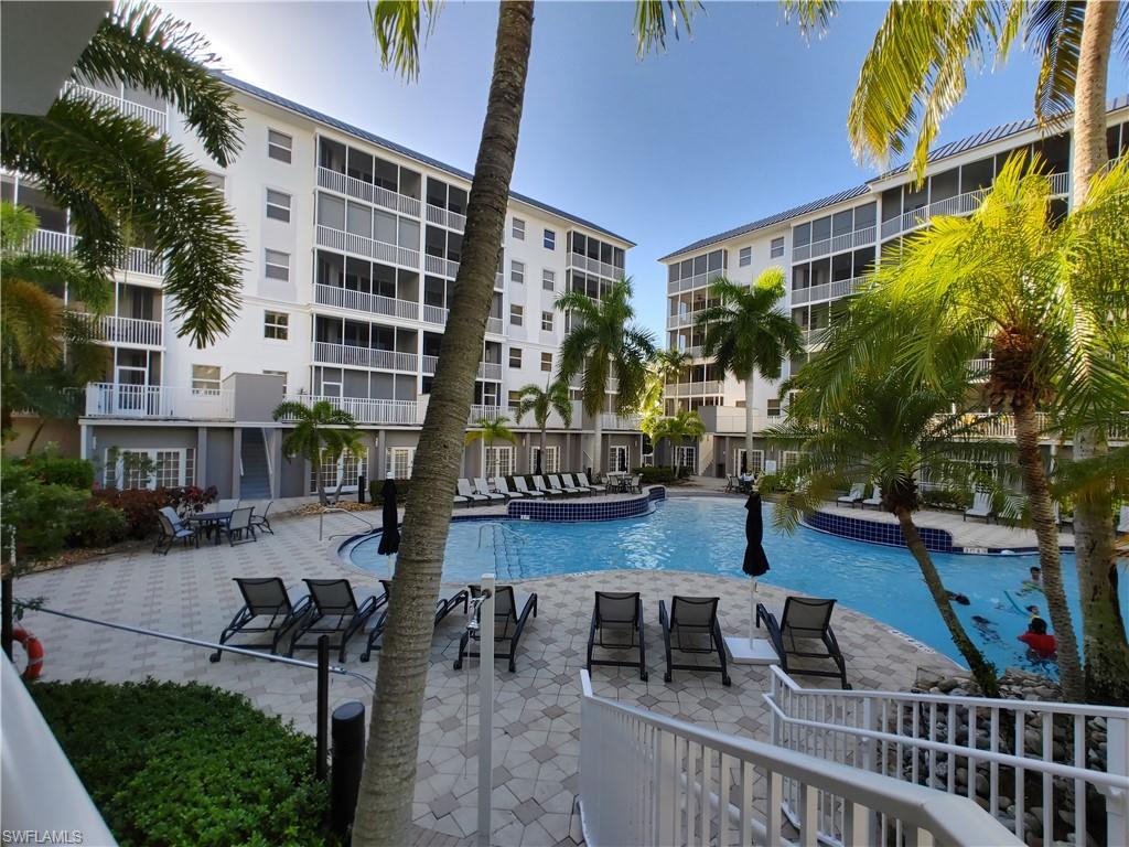 400 Flagship Drive, Unit 501 Naples, FL 34108 - Photo 32 of 38 a view of balcony and patio