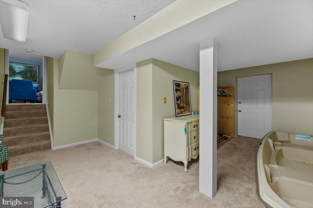 115 Indian Hills Road Locust Grove, VA 22508 - Photo 16 of 20 a bathroom with a sink and a mirror