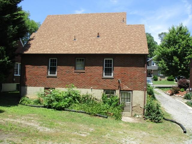 1430 Main Street Southwest Roanoke, VA 24015 - Photo 2 of 21 aerial view of a house with a yard