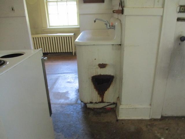 1430 Main Street Southwest Roanoke, VA 24015 - Photo 12 of 21 a bathroom with a sink and a window