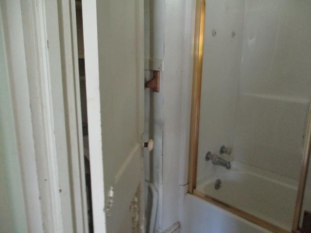 1430 Main Street Southwest Roanoke, VA 24015 - Photo 16 of 21 a bathroom with a bathtub