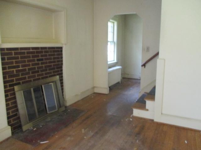 1430 Main Street Southwest Roanoke, VA 24015 - Photo 6 of 21 a view of entryway and hall with wooden floor