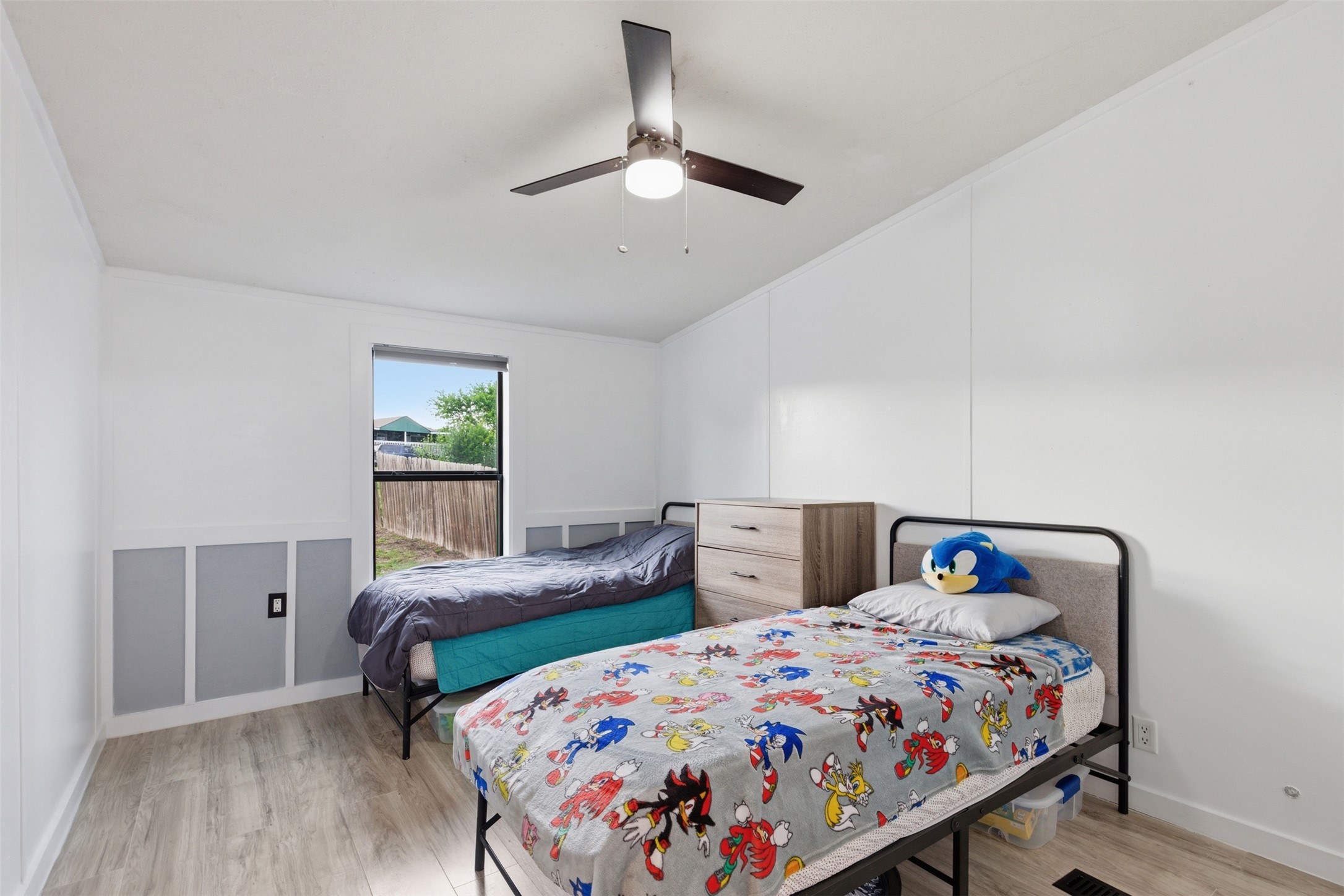580 Railyard Drive Kyle, TX 78640 - Photo 17 of 20 This room features light-colored flooring and a ceiling fan with integrated lighting