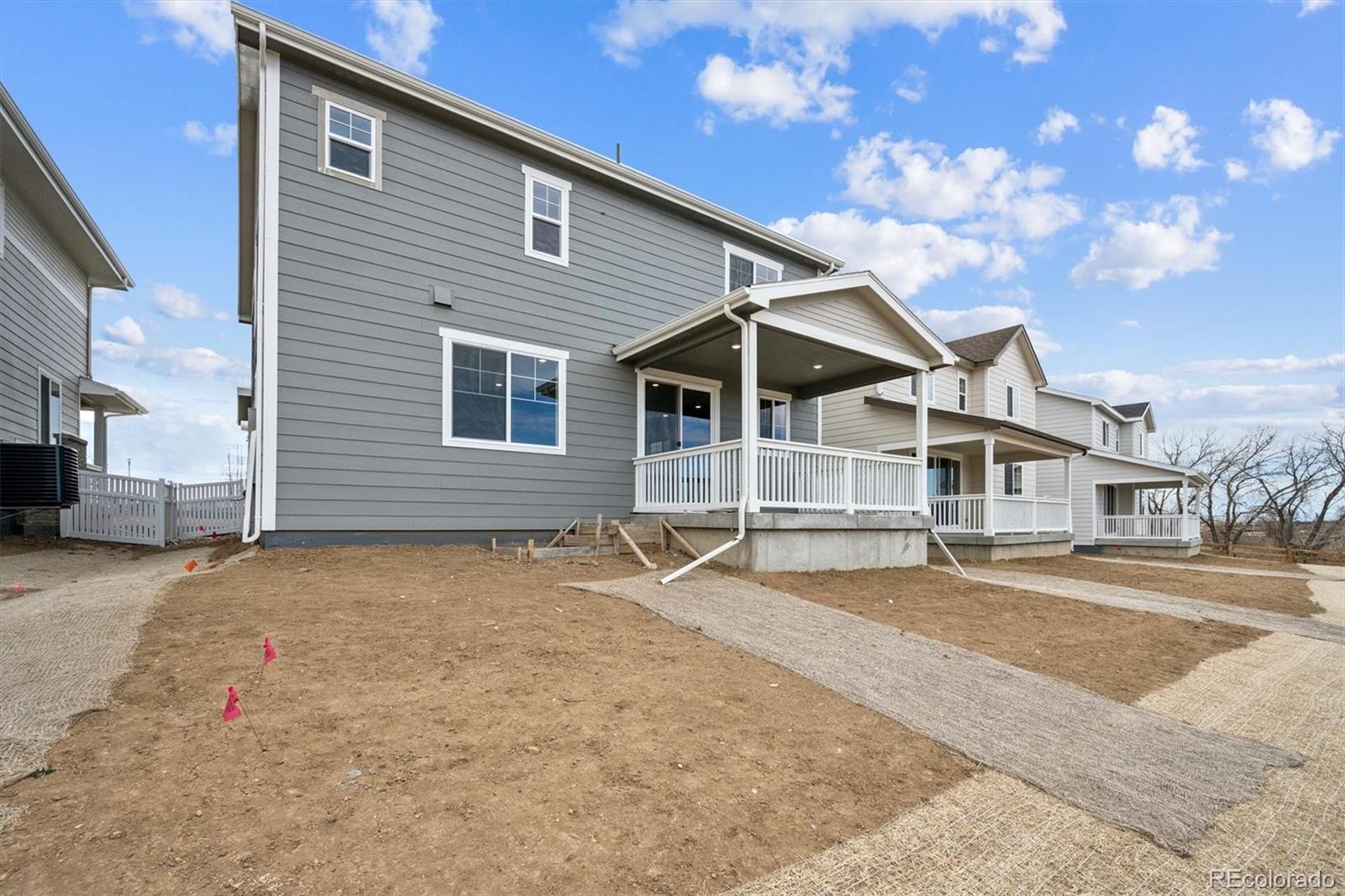 424 South Rifle Street Aurora, CO 80017 - Photo 20 of 23 a backyard of a house with table and chairs