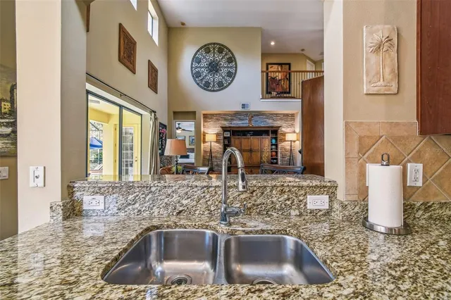 a bedroom with furniture and a ceiling fan