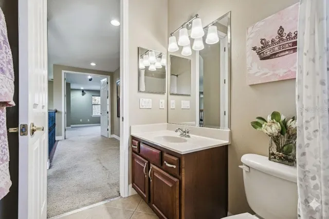 a aerial view of a house with a yard