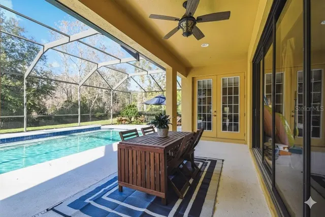 a large white bed in a white room