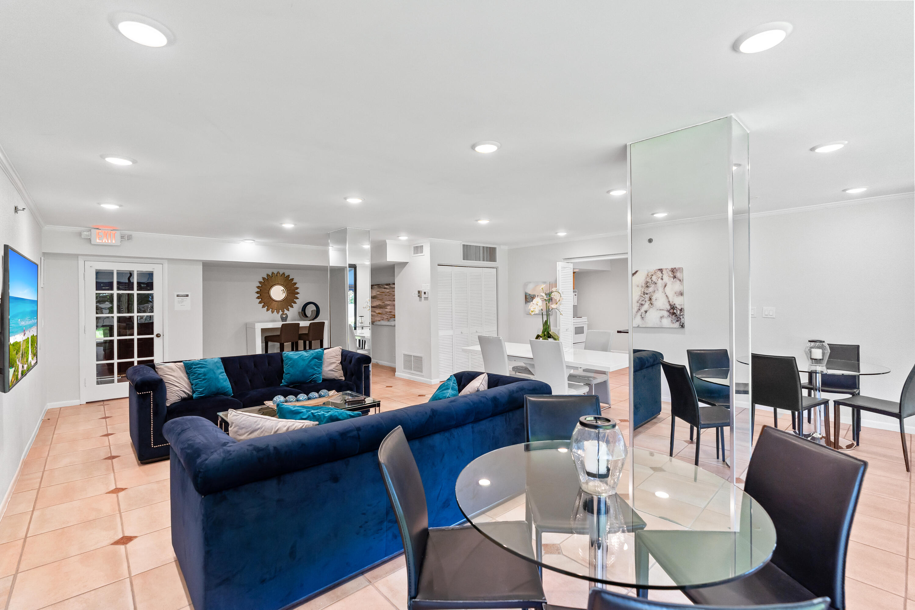 23200 Camino Del Mar, Unit 603 Boca Raton, FL 33433 - Photo 40 of 43 a living room with furniture kitchen and a table