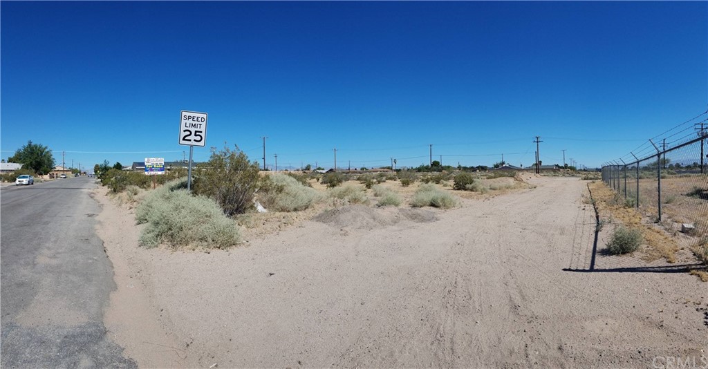 906 West Vulcan Avenue Ridgecrest, CA 93555 - Photo 1 of 1 a view of a road with trees in the background