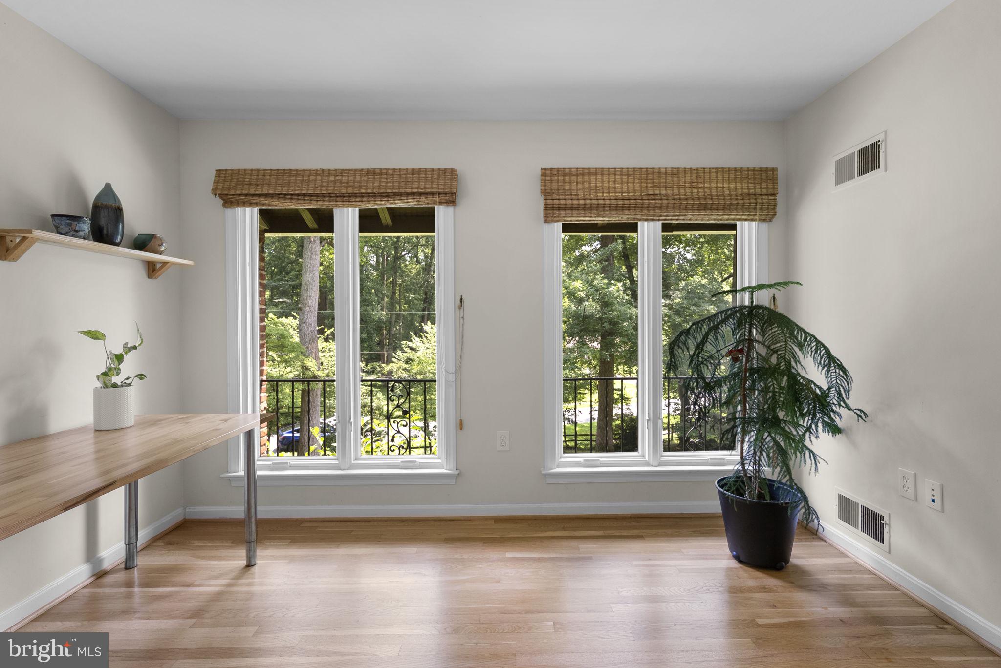 12806 Gaffney Road Silver Spring, MD 20904 - Photo 29 of 57 a view of an entryway with wooden floor and a potted plant