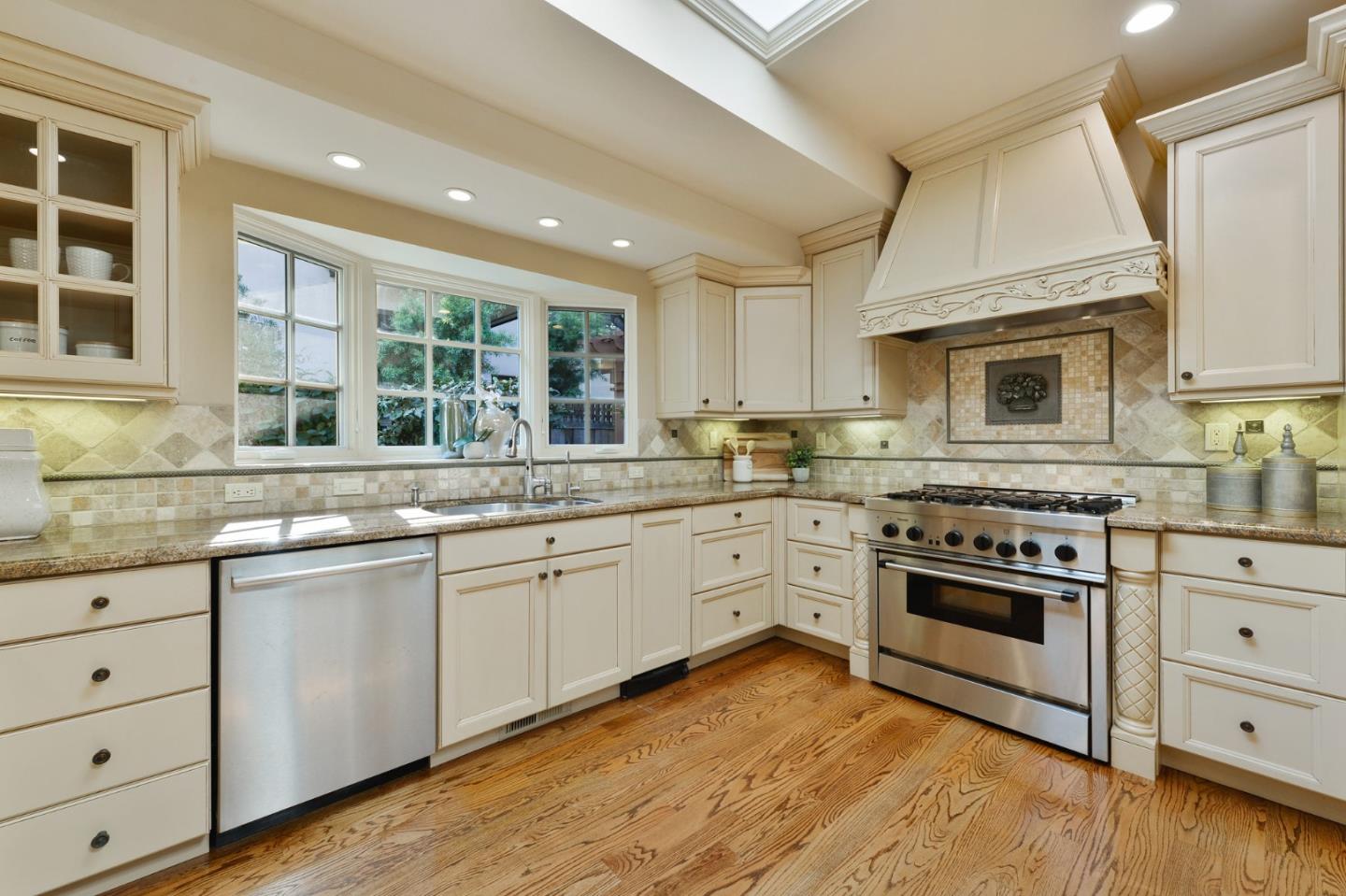 60 Holbrook Lane Atherton, CA 94027 - Photo 12 of 29 a kitchen with stainless steel appliances granite countertop a stove and cabinets
