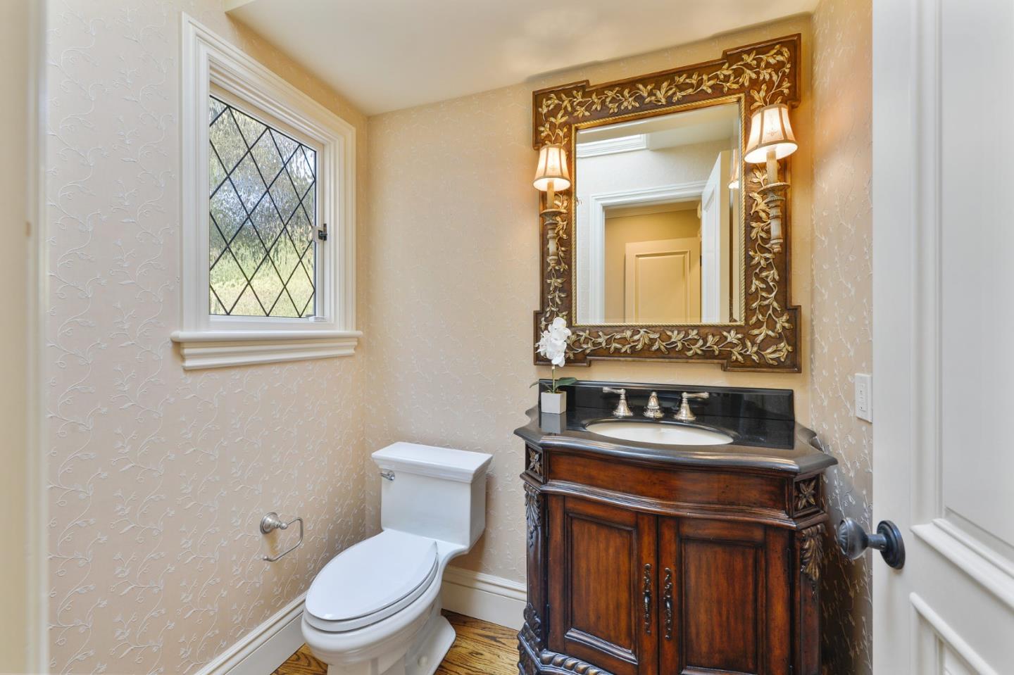 60 Holbrook Lane Atherton, CA 94027 - Photo 21 of 29 a bathroom with a toilet sink and mirror
