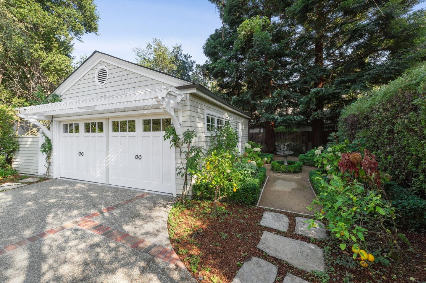 60 Holbrook Lane Atherton, CA 94027 - Photo 28 of 29 a front view of a house with a yard and trees