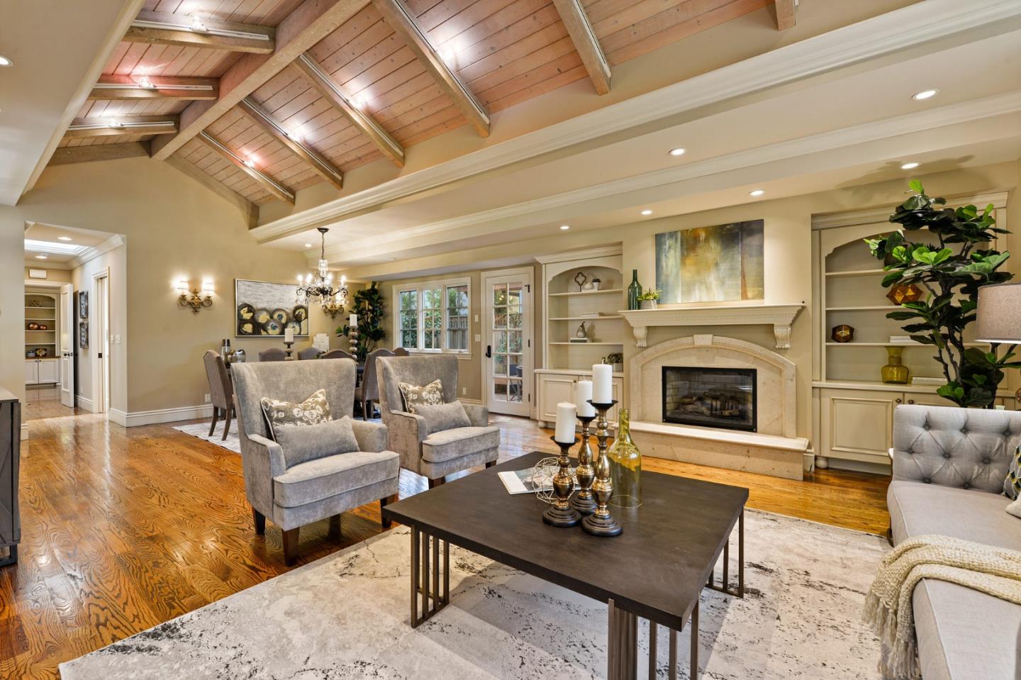 60 Holbrook Lane Atherton, CA 94027 - Photo 10 of 29 a living room with furniture a fireplace and a chandelier