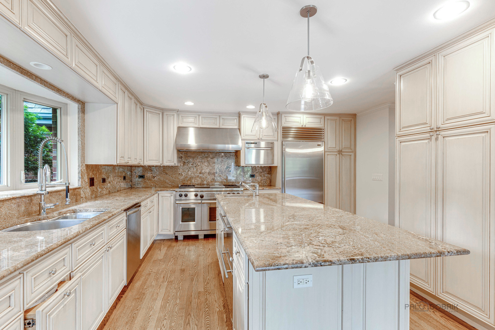 291 West Deerpath Road Lake Forest, IL 60045 - Photo 17 of 37 a kitchen with a center island appliances and cabinets